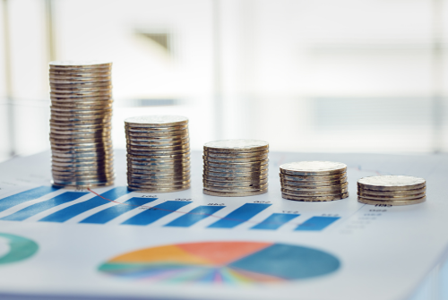 Stacks of quarters on top of a bar chart